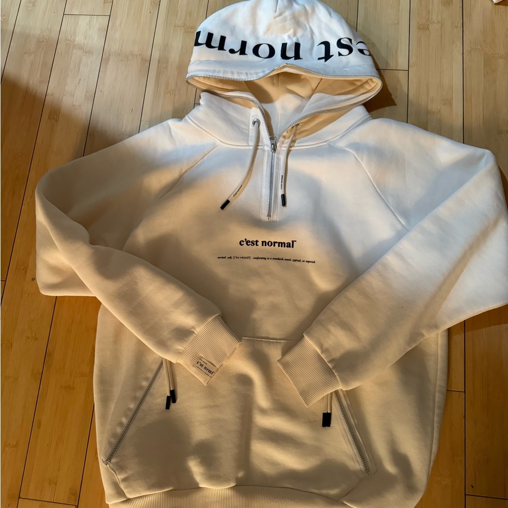C’est Normal hoodie